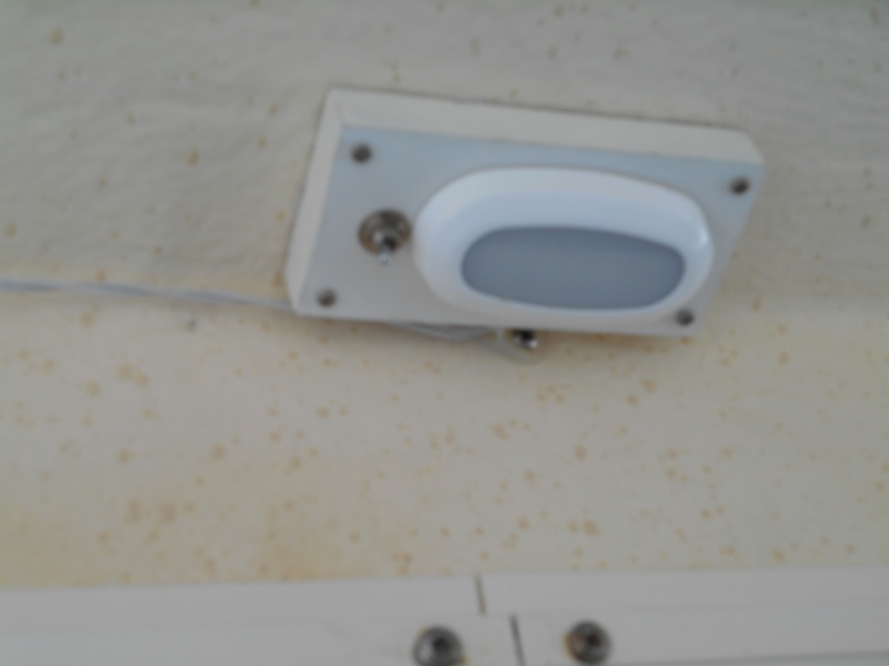 I bought two LED lights, two microswitches, and made 2 reading lamps for the upper berth.