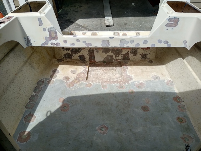 I opened up all areas that had fasteners, that?s a lot of holes. There was some localized core rot, more holes were drilled around those areas and all coring removed. Holes were filled with thickened epoxy or 8lb density foam in larger areas.