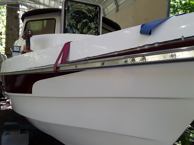 I started drilling holes at the back of the boat and worked my way to the front.  the back has the sharp bend, so I wanted to make sure that it fit good around the bend