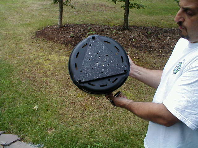 I used a black cutting board purchased at Target to custom make a mount for the Cobb Barbeque
