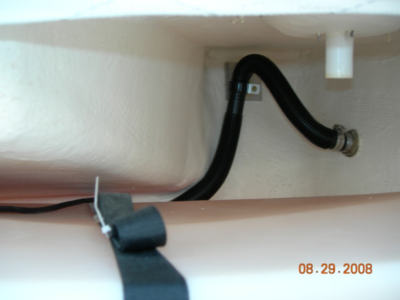 I used the existing through -hull for the additional 1 1/8" dia. bilge pump discharge hose.