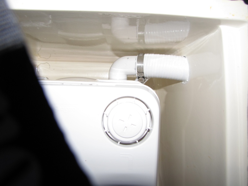 Image---Back of toilet where hoses connect. 3/22/2011