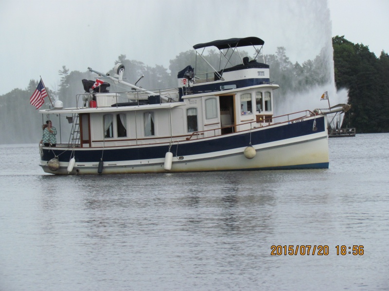 IMG 5216 This boat was from Louisiana about 40 foot. The picture is in Peterborough the aerator in the back round is lit up with colored lights at night. Nice place to stop. They have an ice cream there called Tiger it's marbled with orange and black licorice flavored ice cream. Good Stuff