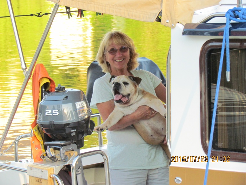 IMG 5275 My wife Ginny and Lucy who we recently had to get her put down. 14 plus years old which for a Bulldog is pretty good. Best of all our dogs! Dink motor mount. More picks of the new boat on the Tugnuts site under the name Scuffy my Tugnut alias