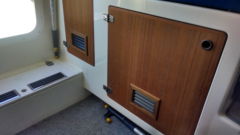 Installed louver vents to prevent mildew in aft locker. They worked.