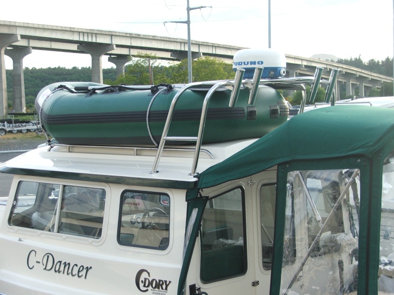 Installed the Furuno 1623 Radar.  The Alaskan Series dinghy fits perfectly under the tall arch.