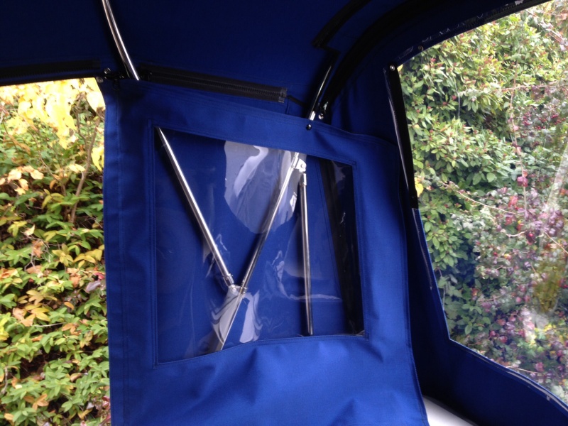 Instead of roll up, we wanted pull aside panels to snap up, keeps entry clear of obstruction