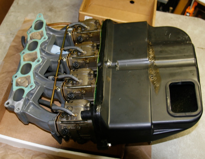 Intake, Carbs, Silencer-from-back-side:
The intake gasket and all carb gaskets should be replaced.