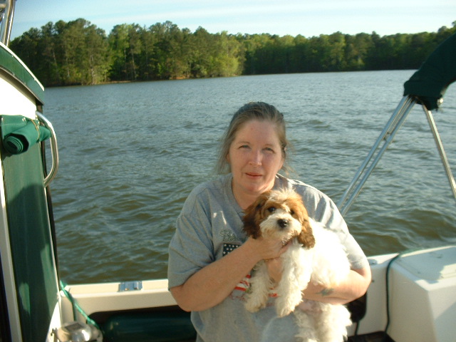 Introducing Angus McKenzie to his first boat trip.

We lost our little guy to liver failure at only 20 weeks old on May 29, 2009. We miss him.