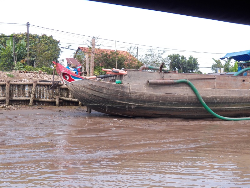 It looks like it was re-purposed. It now pumps water out of a canal connecting the upper and lower Mekong. There was no place to go ashore and see what the water was used for.
