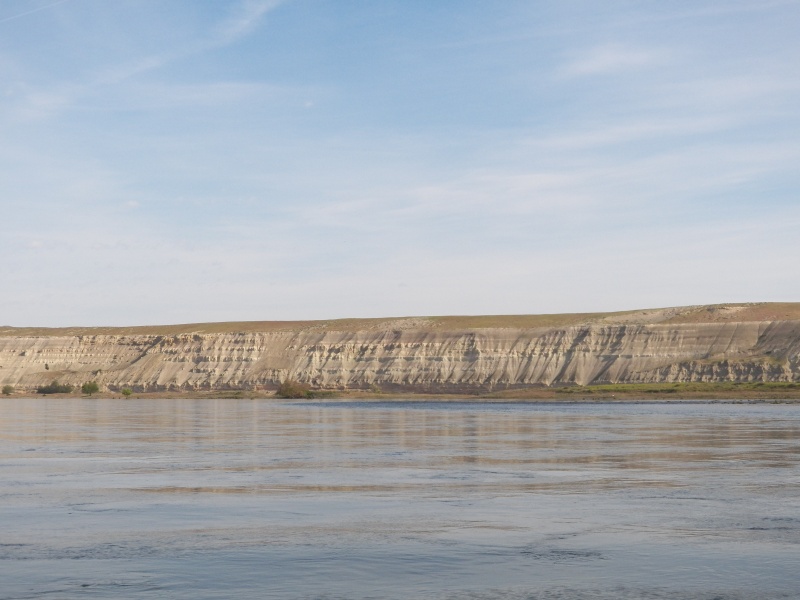 It's hard to get a feel for the size of the cliffs from a picture.  The trees at the base are 20 to 30 foot cottonwoods.