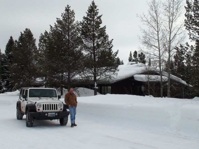 Jay by jeep in front Colter Bay, Marina Information Building