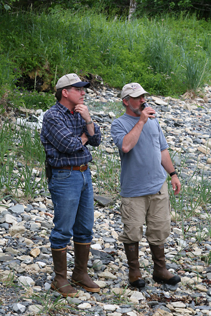 Jim and Tom enjoy a moment at the gathering.