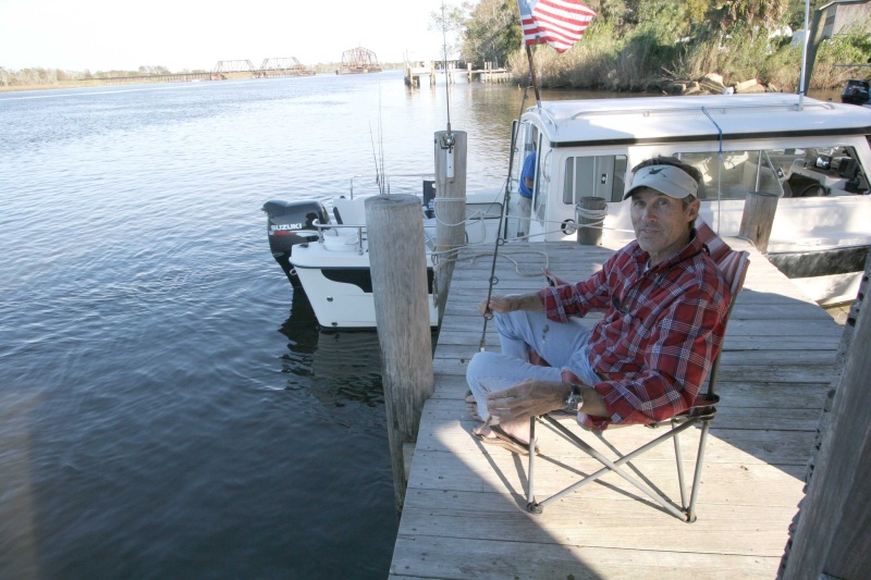 John fishes on the river