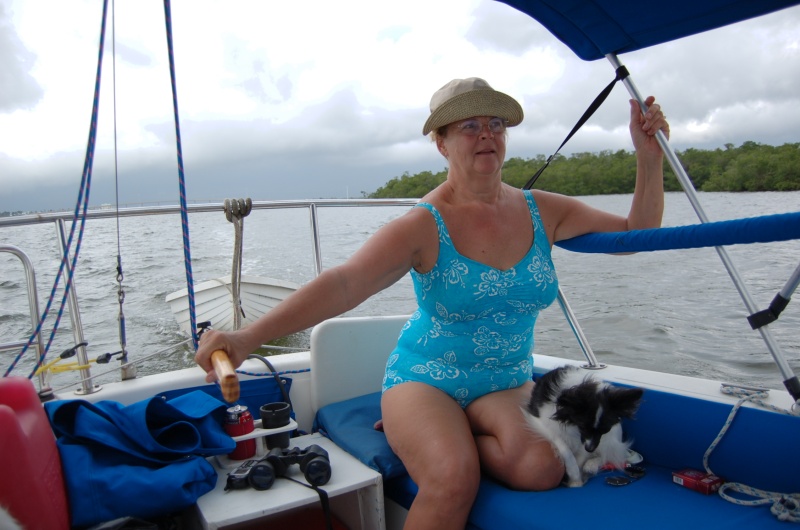 Judy at the helm with Parate hat.
