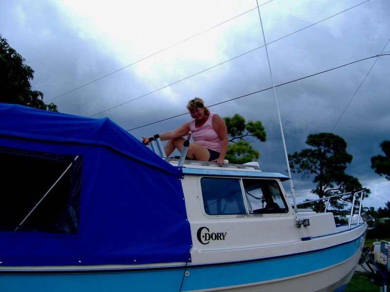 Judy is on top of the final Camper Top  fitting.
Total Cost of Materials was $704.00
Total Hours of Production was 48
Free Labor of Talented Lady..Priceless
