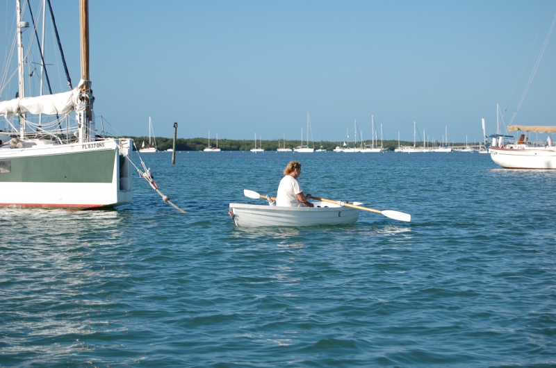 Judy rowing back from puppy patrol and showers...