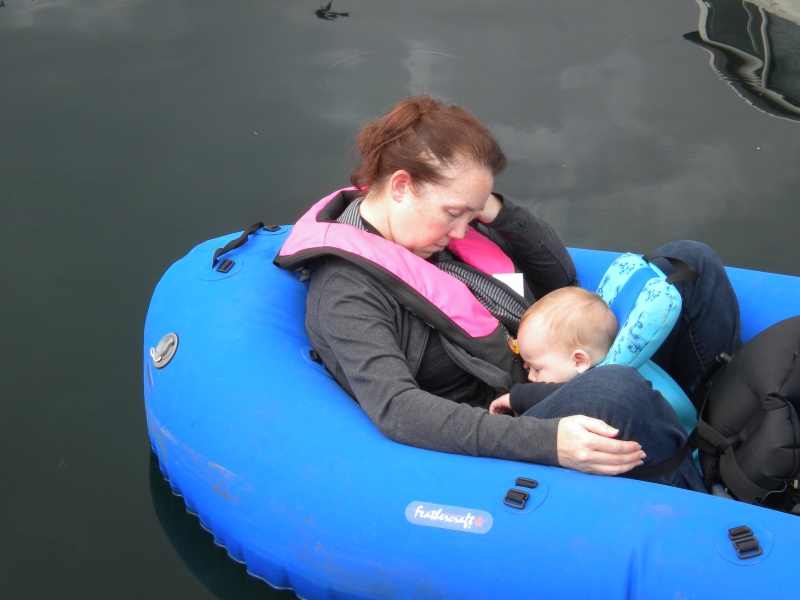 Julia and the newest crew member of  Two Lucky Fish+1 catching a nap.