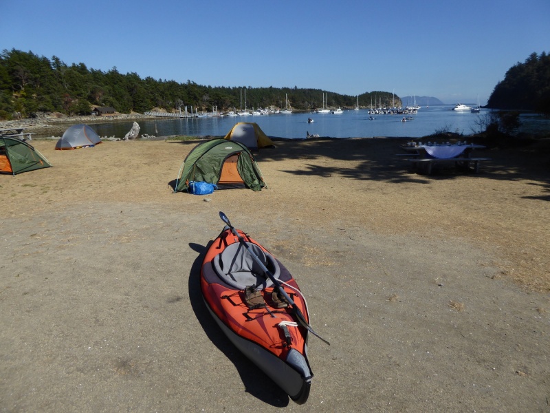 Kayak on isthmus looking towards Fossil Bay