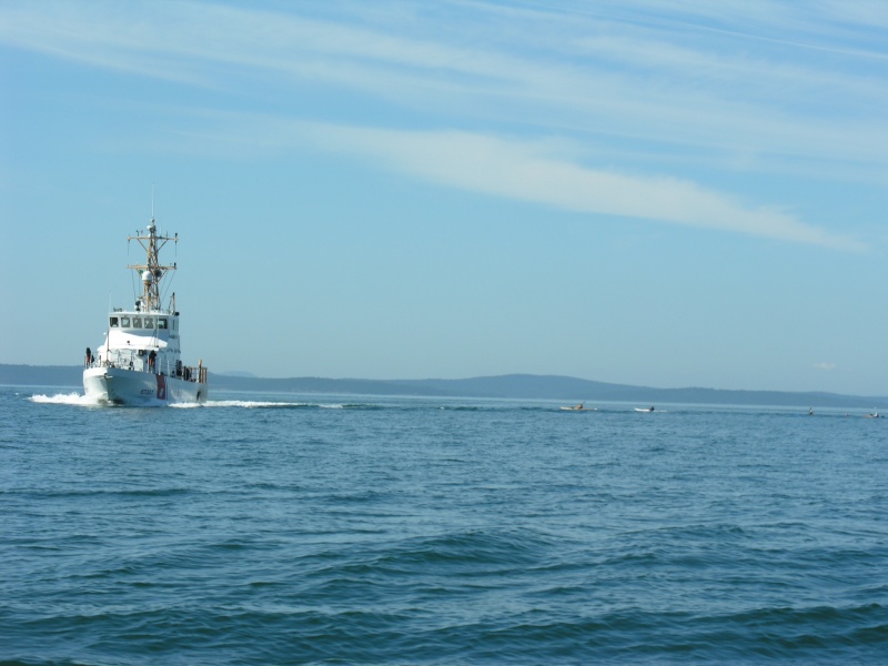 Kayaks chasing Coastie
