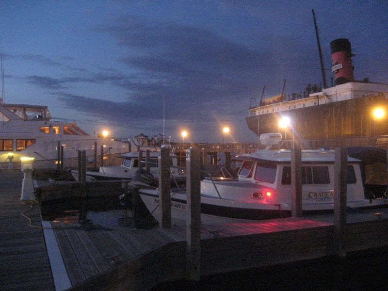 Kemp Marina at night. Not-For-Hire and the freighter Valley Camp in background.
