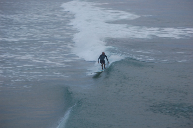 Kids surfing by Surf CityPier