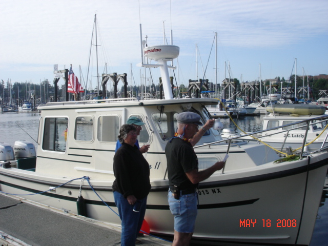 KINGFISHER II
Christening of the new
Rosborough, owned by
Merv and Kathy