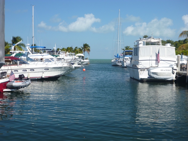 Kismet on the left with dinghy davits on the swim platform looking out at Florida Bay