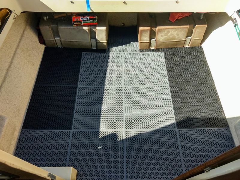 Laid it out using as many of the gray tiles as possible. There were 9 (18"x18") of each color.
