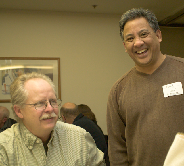 Larry & Peter enjoying the potluck.