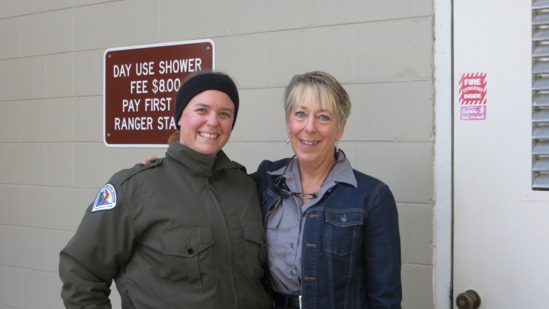 Laura a park ranger with one of the volunteers
