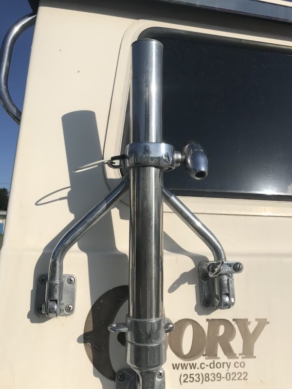 Lee's outrigger base, one each side.  Do not have the official outrigger poles.  They work good just putting the fishing rod directly into it.