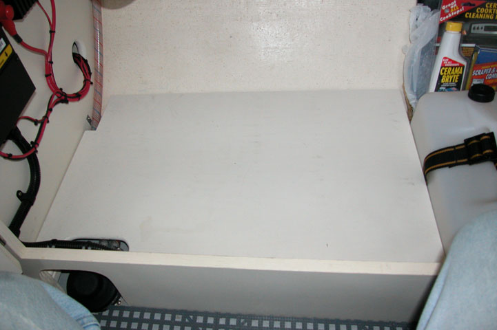 Level floor in galley cabinet.  Made out of 1/2" ply and screwed to cleats for easy removal.