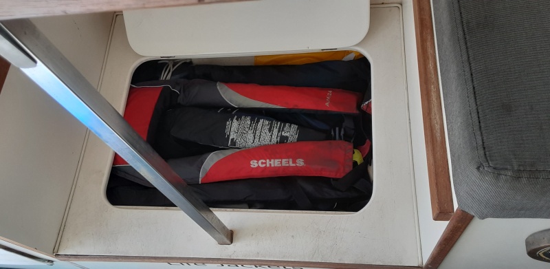 Life jacket storage under main table area