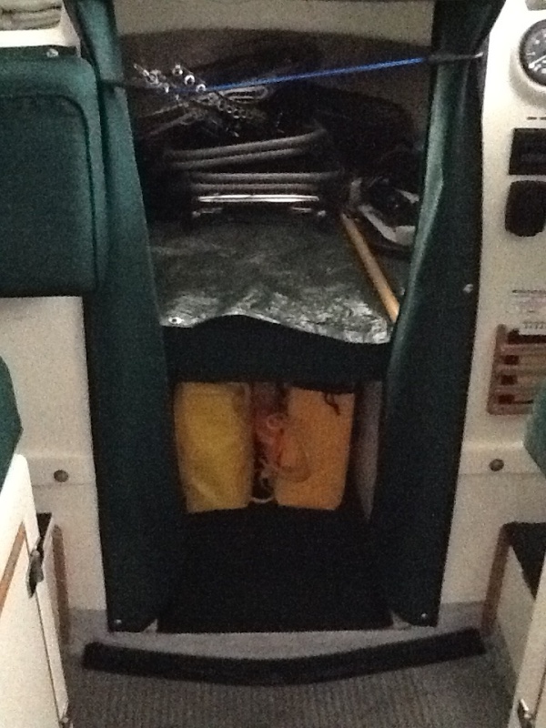 Life raft and ditch bag. Throw rope in the middle