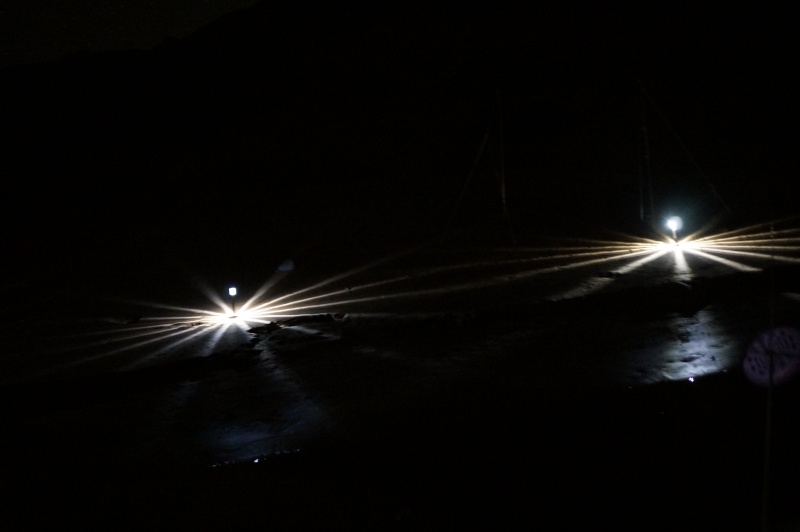 Lights by anchor lines at night