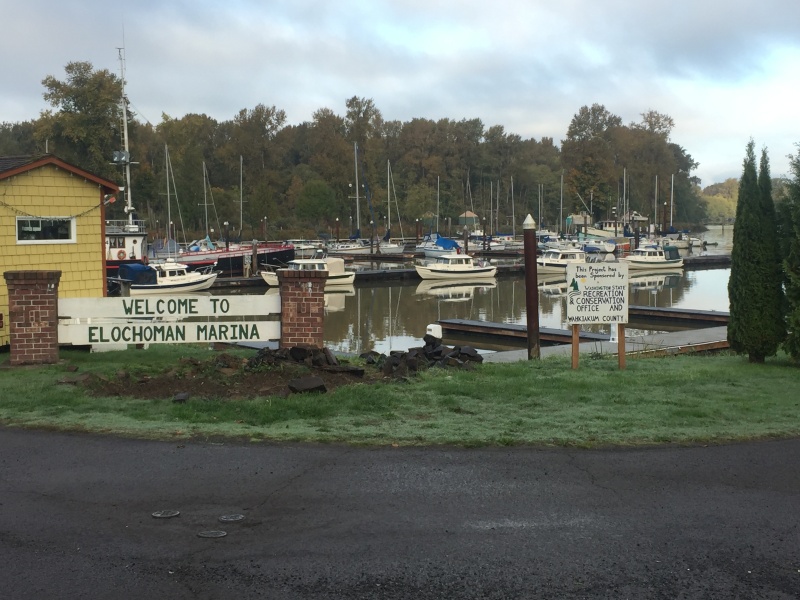 Locals might know it as the Cathlamet marina, but this sign is also how it\'s named on the charts! Our boats in the background.