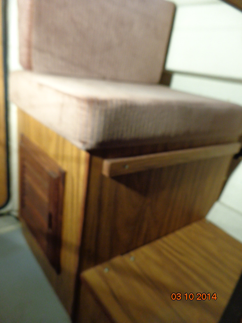 Louvered door added to storage area under the seat where the water tank used to be.