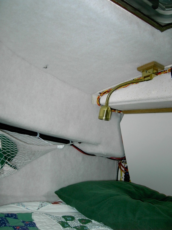 (Lynn Marie)Carpet on cabin roof, side, deck, & hull @ starboard by electrical panel cover.