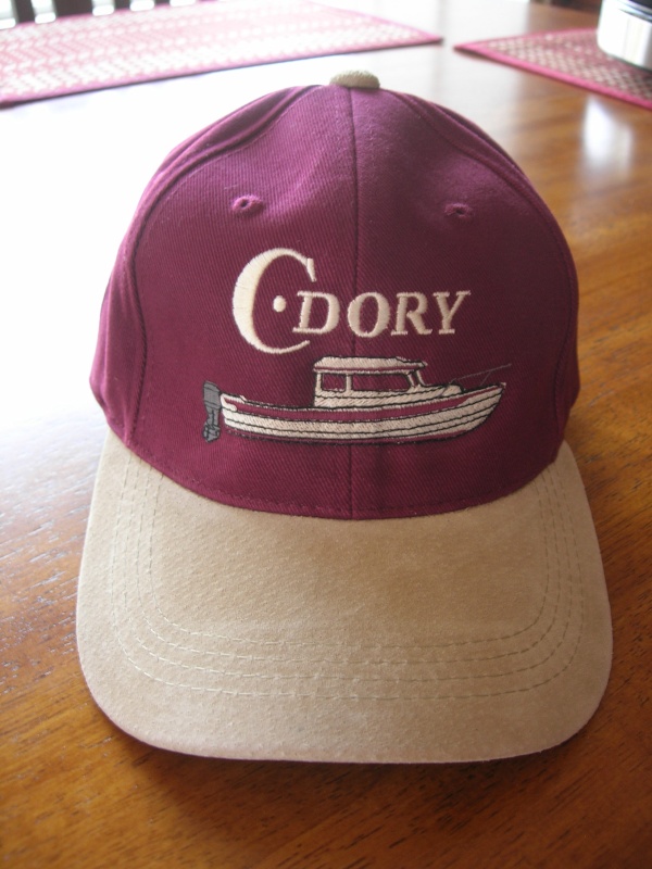 Made by Bergen & Co Embroidery Works in Bellingham, WA.  They have this C-Dory logo already set to use on a wide variety of clothing.  Their work is beautiful and they are fun to interact with.
