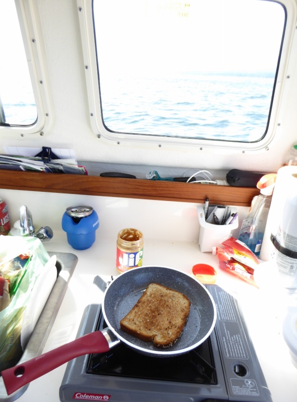 Making breakfast while waiting for waves to die in the Strait