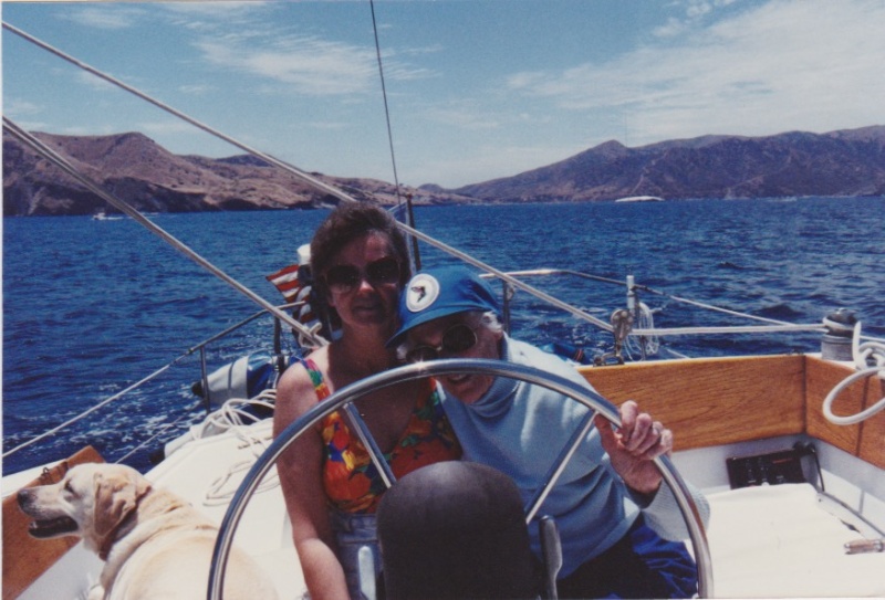 Marie and my mother at age 87 at the helm of \"Thataway\"