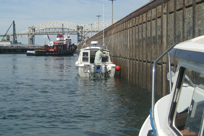 Mark/Not-For-Hire, keeping her steady upbound in the Poe Lock. (The Poe lock is 366 meters (1200 feet) long, 34 meters (110 feet) wide and 10 meters (32 feet) deep.