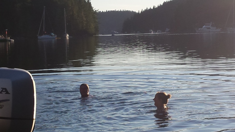 Martin and Caryn swimming in the warm waters of Melanie Cove