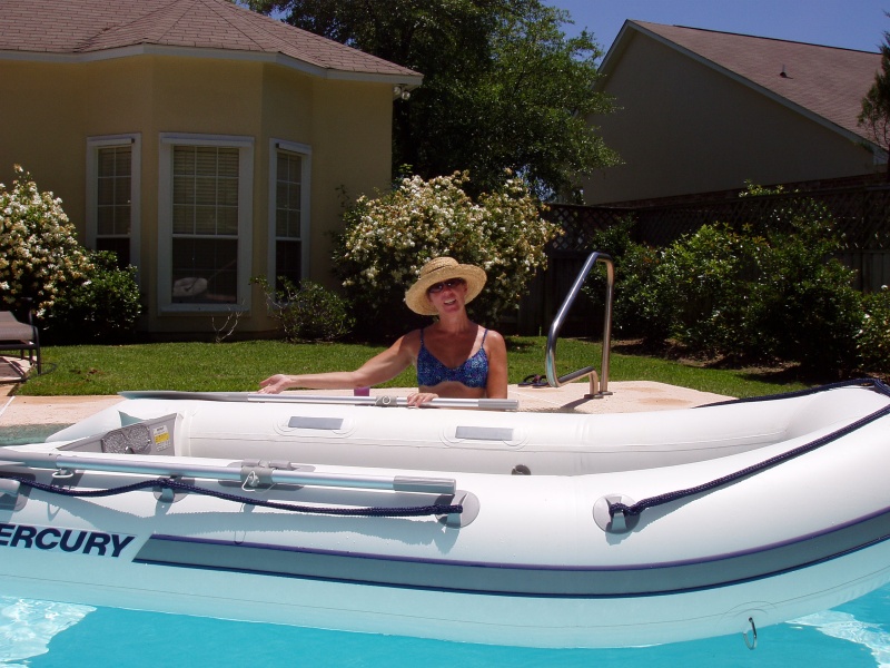 Mercury 310 Air Deck in the pool.  A Honda air cooled 2.5 kicked it along.