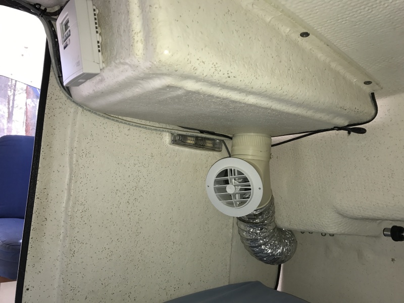 Mermaid air conditioner control, led light and air conditioner vent in v-berth.