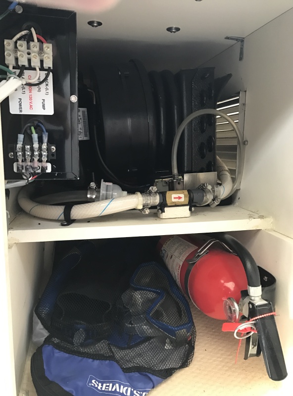 Mermaid Marine air conditioner and fire extinguisher under passenger seat