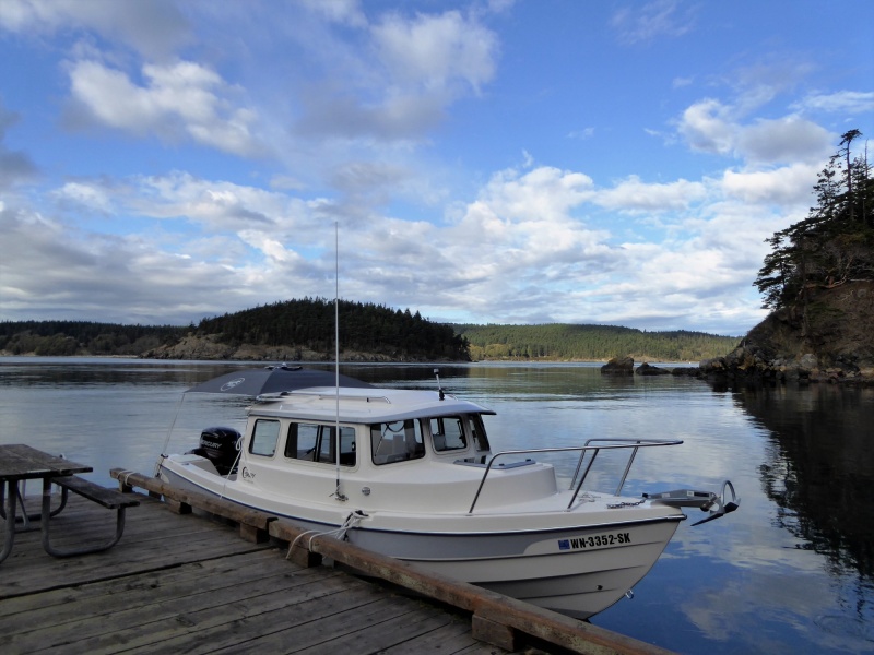 Monday morning, before the sun has risen above the island to warm up the boat.
