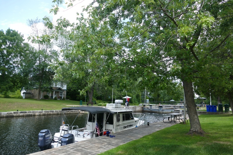 'Mooring' above a Rideau canal lock 'on the wall' is cheap and unlimited with a seasonal pass (for 'locking' a seasonal pass is also advised for this Triangle Loop was about $230 Canadian for us).