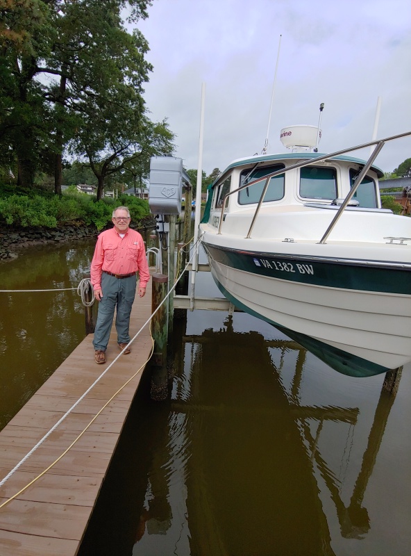 My boating friend Steve, with Osprey, a 26 Venture, the Cadillac of C-Dory's, in Virginia.